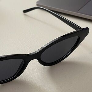 Bold Black Cat-Eye Sunglasses – Retro, Trendy, and Fierce